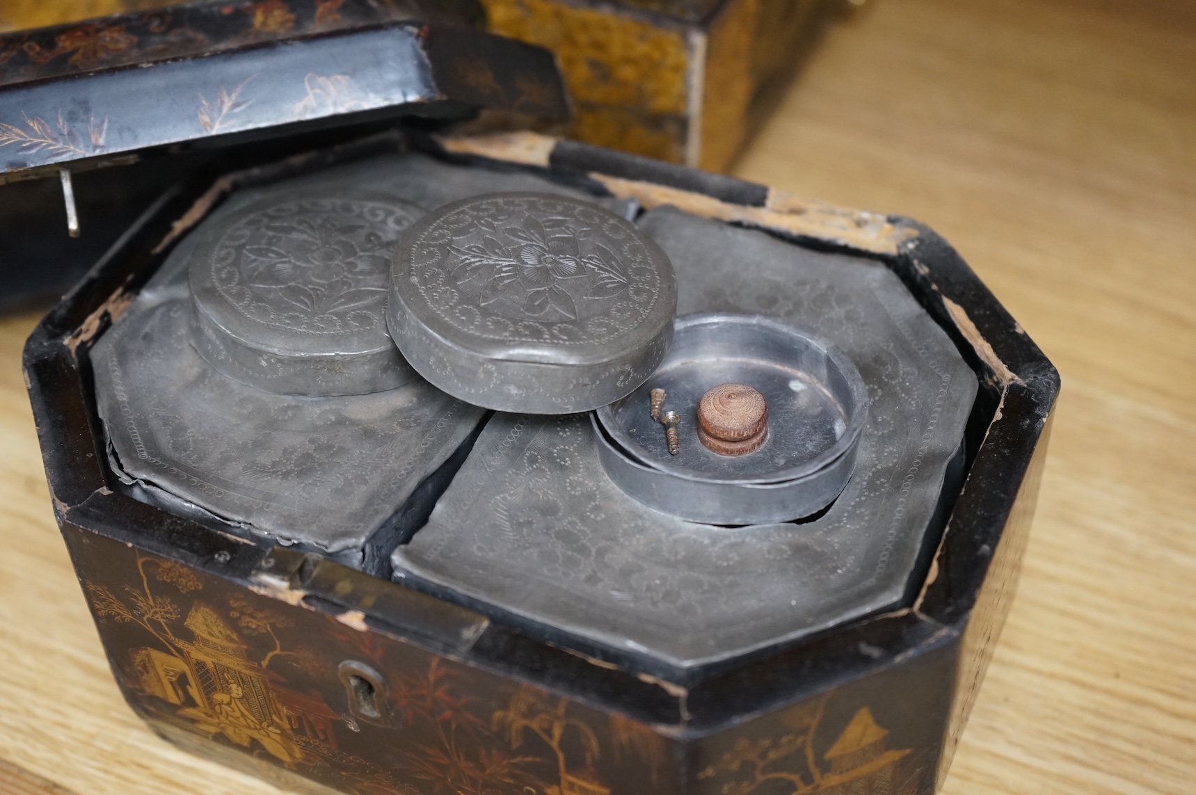 A Chinese lacquer tea caddy and a japanned sewing box (2)
